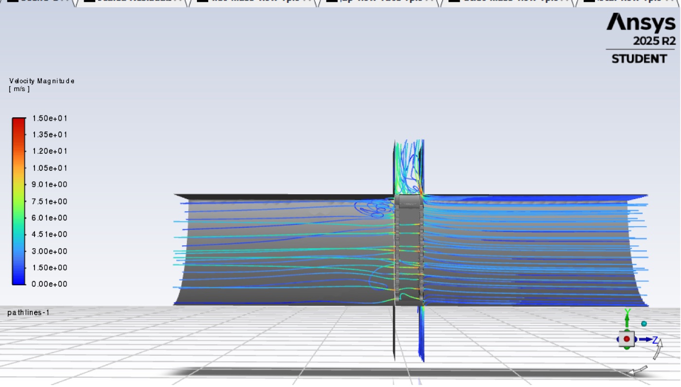 Pathlines colored by velocity magnitude showing airflow bypassing through the gap versus passing through the wheel.